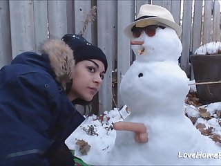 Beautiufl amateur girl gets fucked from behind outdoors by snowman