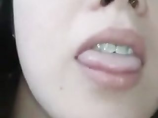 hot young girl taking close-up video for bf